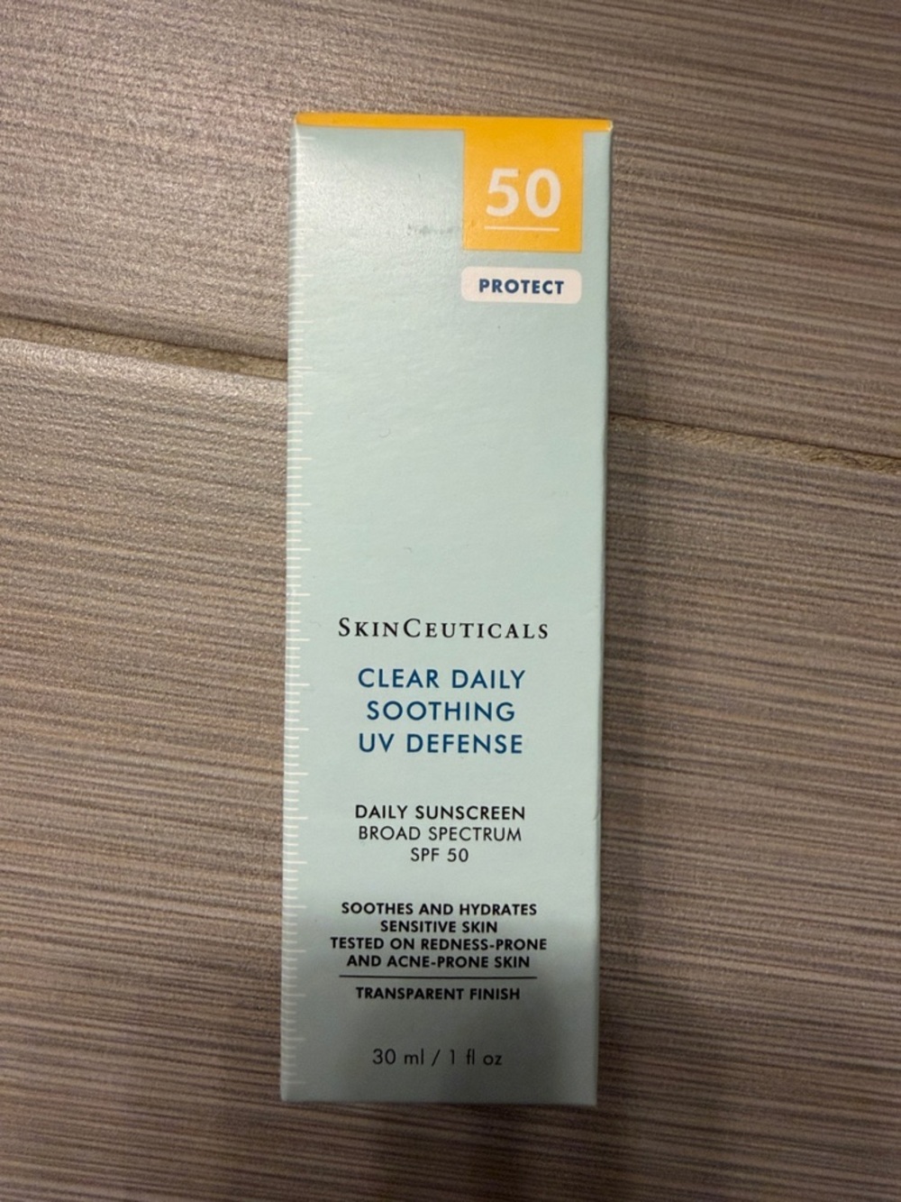 SkinCeuticals Clear Daily Soothing UV Defense SPF 50 - Light Blue and Yellow